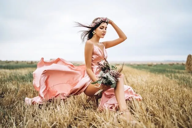 A woman with long wavy hair, wearing a loose floral maxi dress, adorned with layered necklaces, beaded bracelets, a wide-brimmed straw hat, and fringed ankle boots, under a sunny sky in a field.
