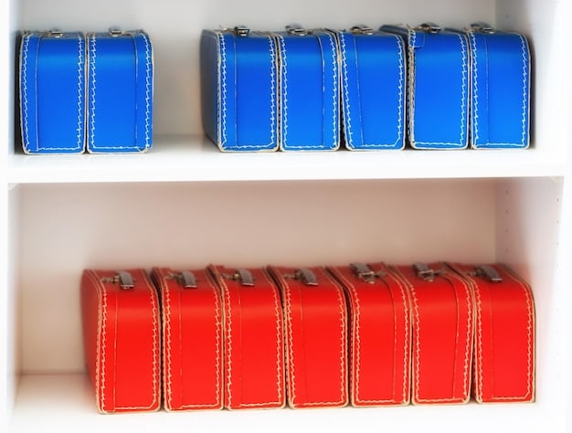 A close-up shot of several packing cubes inside a suitcase, with each cube neatly filled with different categories of clothing. The cubes are various colors, and the clothing inside is neatly folded or rolled.