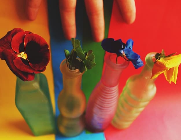 A close-up of a person's hands transforming an old glass bottle into a decorative vase, using colourful paint and twine. The focus is on the creative process and the vibrant results of upcycling.