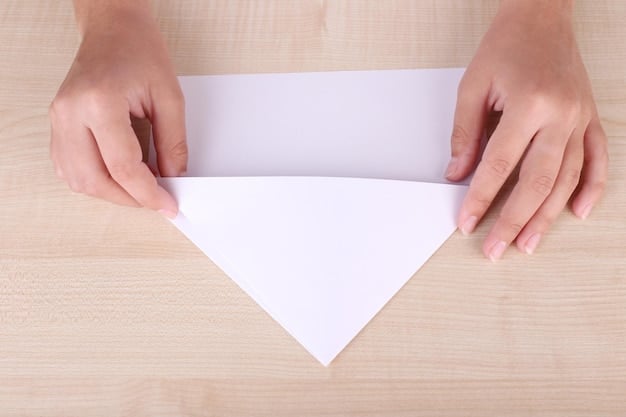 A step-by-step visual guide showing how to fold wrapping paper to create sharp, clean corners on a rectangular gift box. Each step is clearly illustrated, highlighting the correct folding angles and how to secure the paper for a flawless finish.