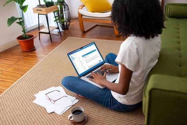 A person using a laptop at home to access their local council's website to check Council Tax Rebate eligibility.