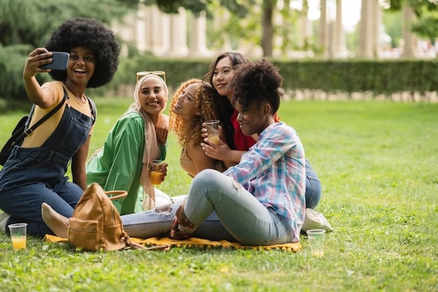 A group of diverse friends laughing and enjoying a picnic in a park on a sunny day. The atmosphere is light and joyful, representing the positive impact of social connections on well-being.