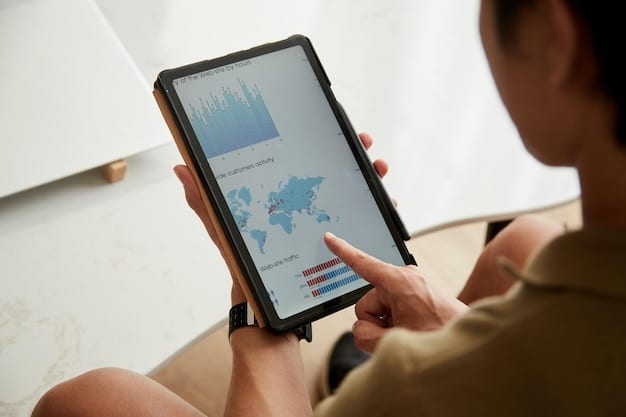 A close-up shot of a hand hovering over a tablet displaying a dashboard with key performance indicators (KPIs), graphs, and charts. The background is softly blurred, focusing attention on the actionable data being presented.