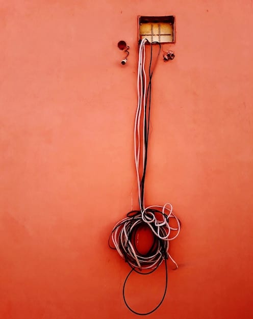 A split image showing a DIY home security installation on one side (messy wires, tools scattered around) and a professional installation on the other side (clean, organized setup with a technician in uniform).