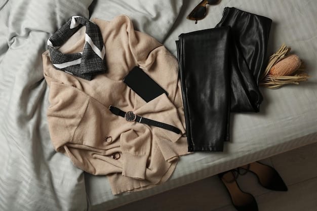 A flat lay showing a meticulously organized Shein capsule wardrobe, featuring black tailored trousers, classic straight-leg jeans, and neutral wide-leg trousers, all neatly folded and ready for mixing and matching.
