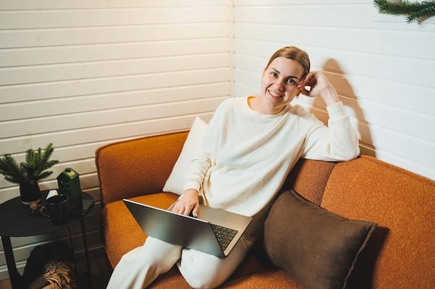 A person in a stylish Shein work-from-home outfit, sitting comfortably on a modern sofa with a laptop, looking relaxed but polished, possibly wearing a knit set or elevated joggers with a chic top.